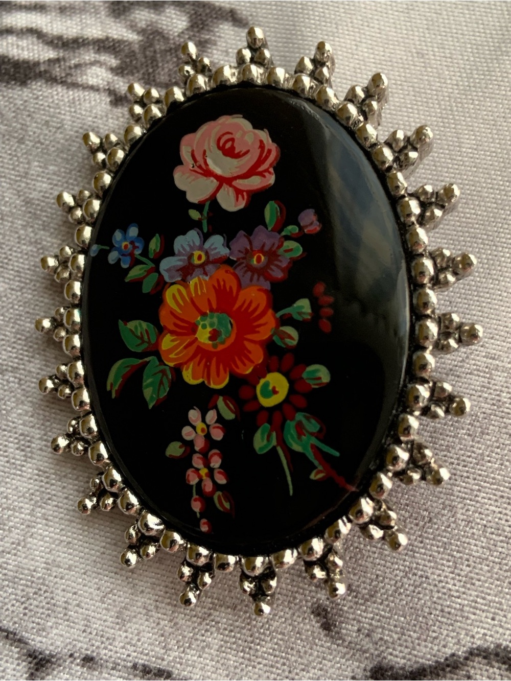 Sarah Coventry Black Floral Painted Cabochon Brooch with Red Orange Pink Accents